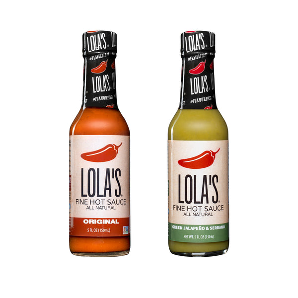 Two bottles of Lola's "Love & Luck" Hot Sauce 2-Pack, featuring red and green sauces, perfect for adding dynamic flavor to any meal.
